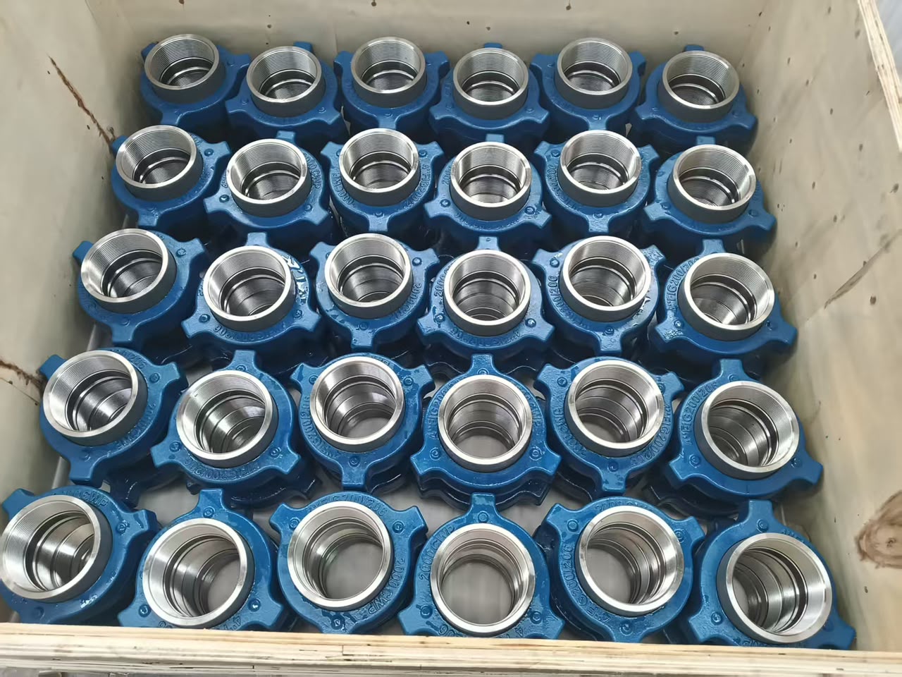 A crate of fittings prepared for supply