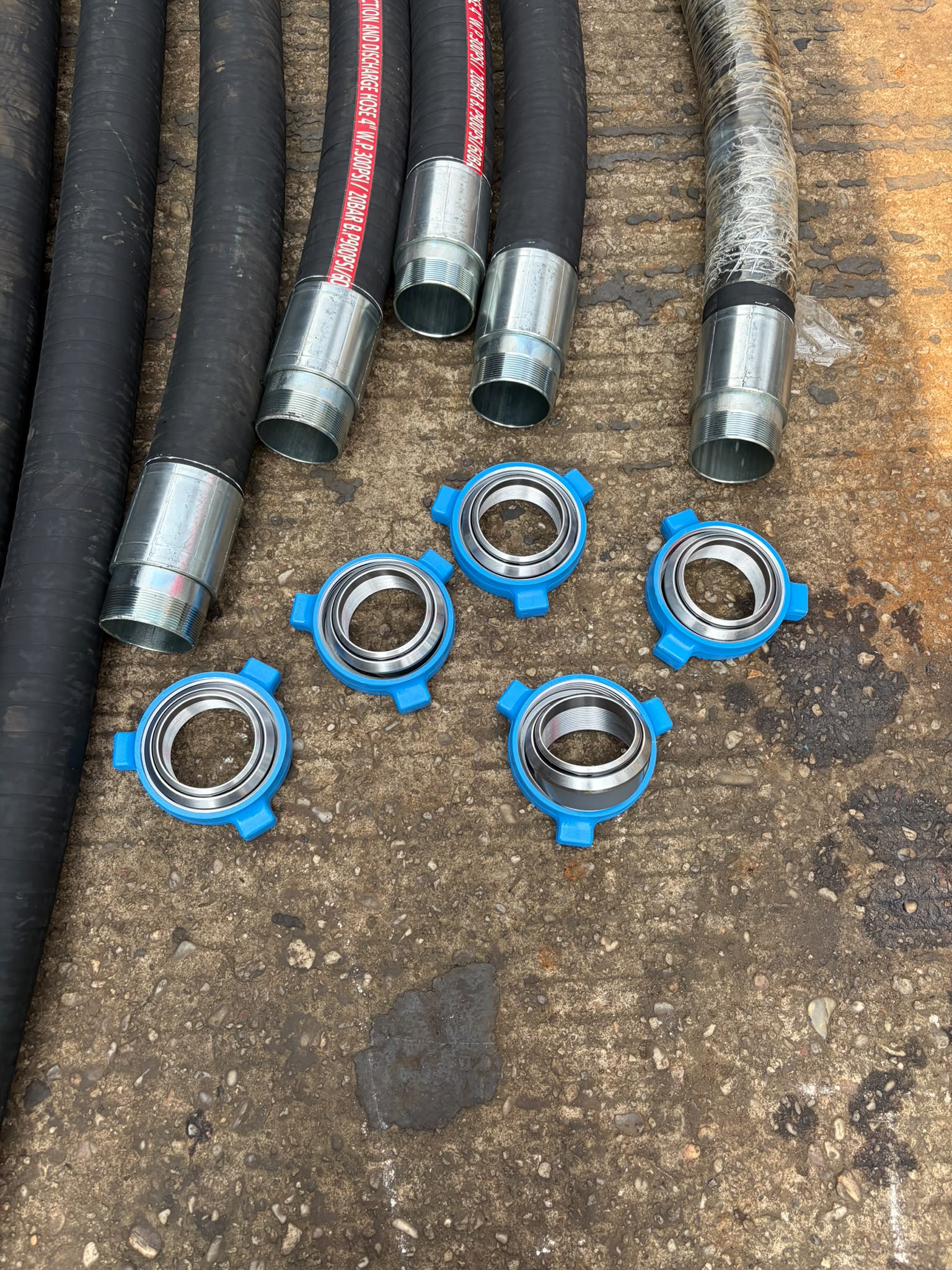 Flange fittings supplied by Fabec Hydraulics, arranged in a crate